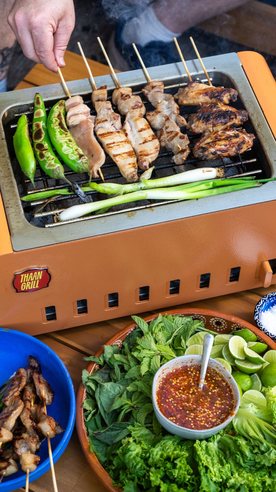Chicken thighs, wings, and whole fish