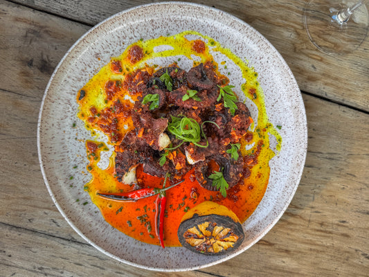 Spicy Octopus with Blistered Chilies made on Thaan Grill