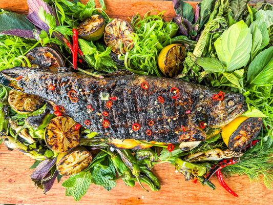 Grilled Trout with Herb Salad from Thaan Charcoal and Grills